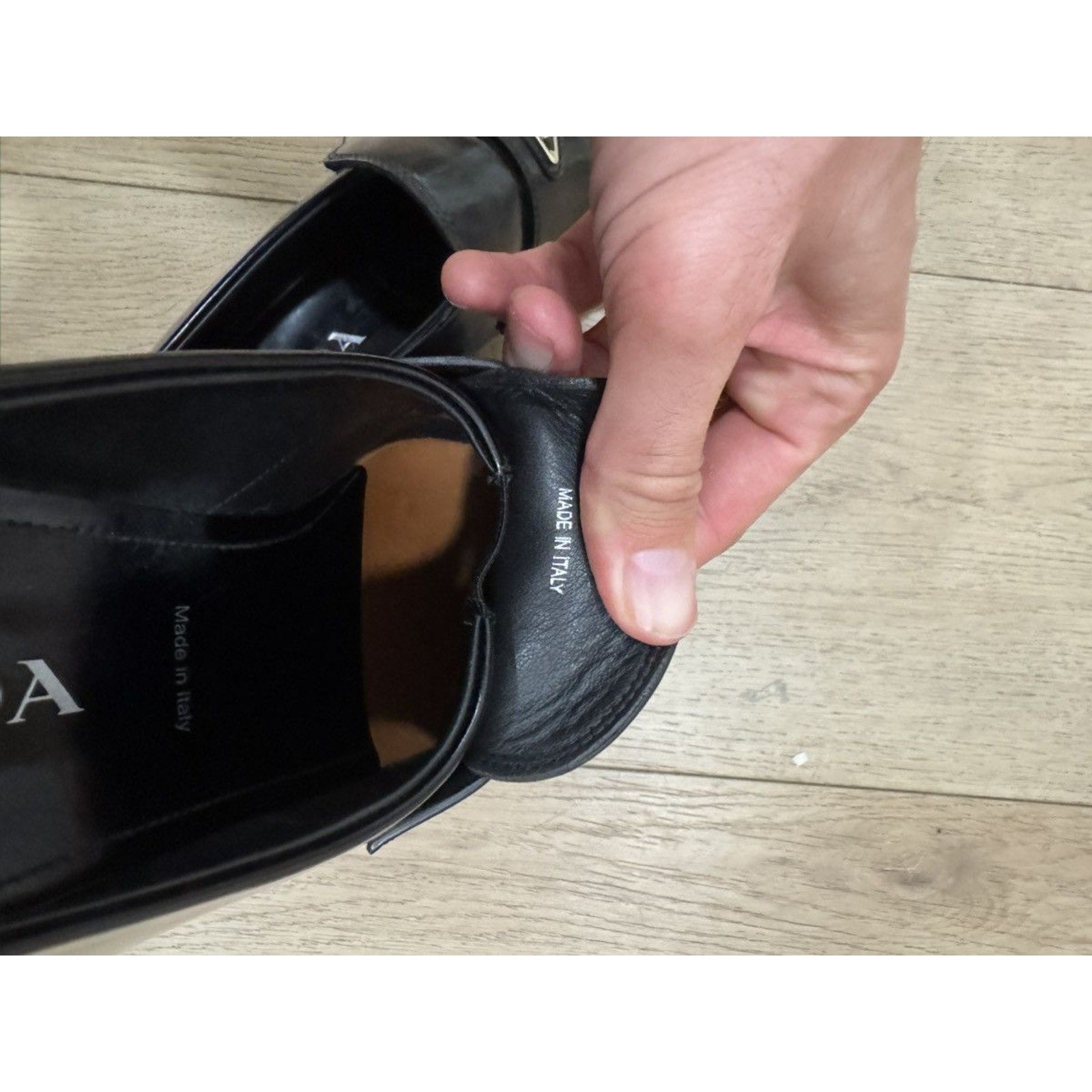 Prada Triangle logo pointed loafers 11