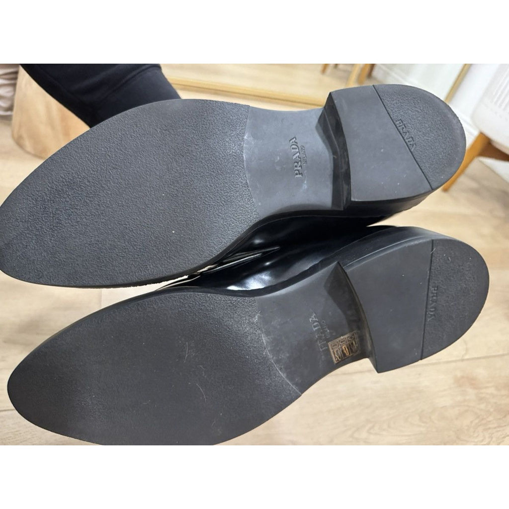 Prada Triangle logo pointed loafers 11