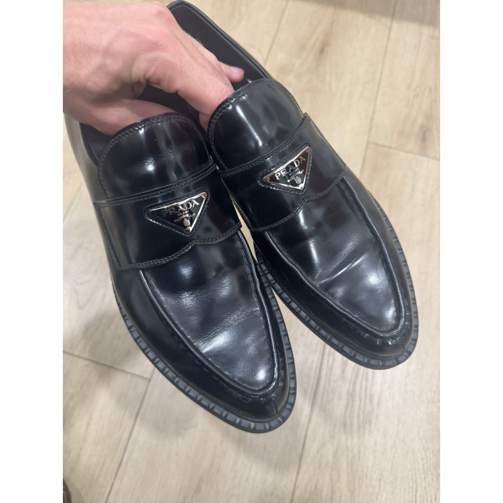 Prada Triangle logo pointed loafers 11