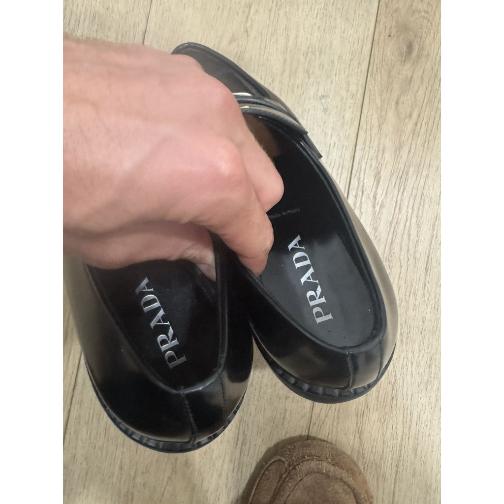 Prada Triangle logo pointed loafers 11